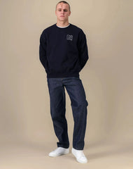 Low-top sneakers in leather and grained leather